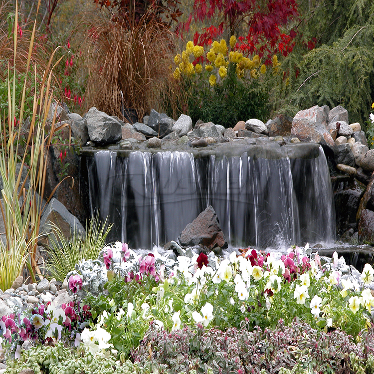 Dolphin Series HydroPure™ Filtered Pondless Systems create beautiful large backyard waterfalls.