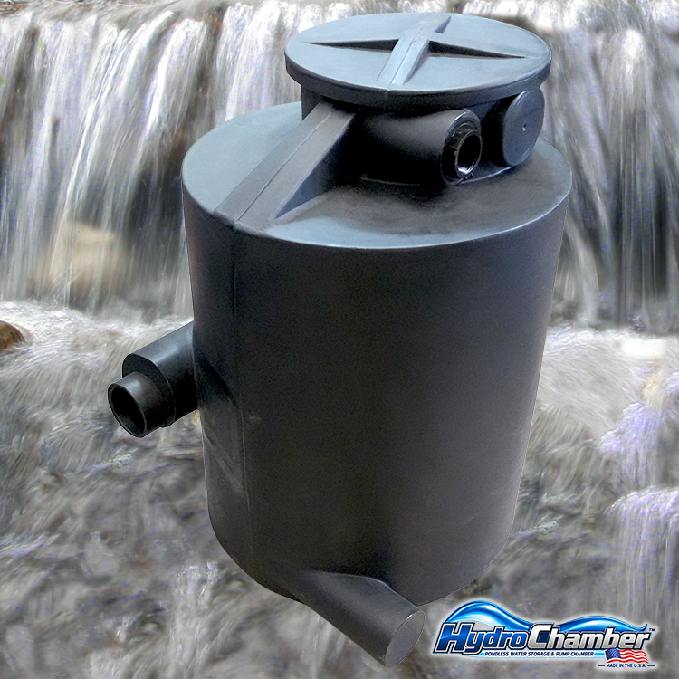 HydroChamber™ underground pondless water storage and pump chamber with access lid and plumbing connections over a waterfall background.