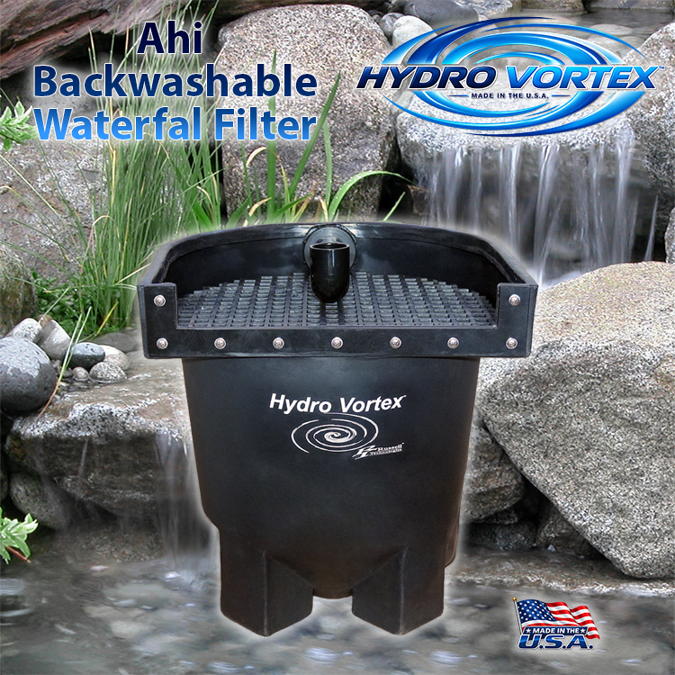 Ahi Hydro Vortex™ 16-inch biological waterfall filter for ponds and pondless waterfalls with rocks, water, and a small waterfall in the background.