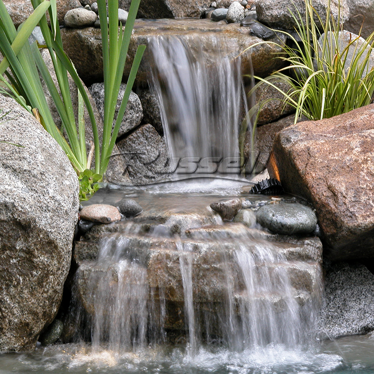 Marlin Series HydroPure™ Filtered Pondless Systems create beautiful waterfalls and clean water.
